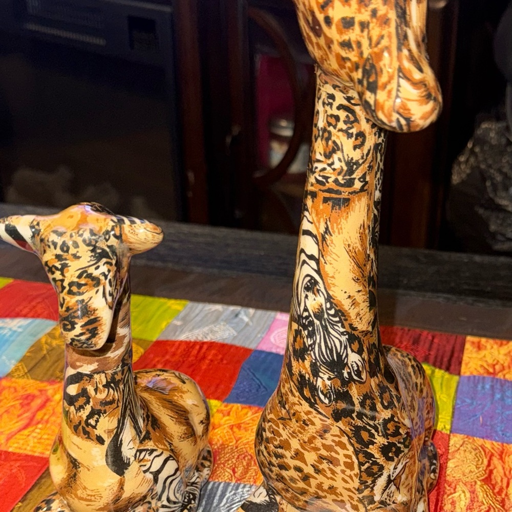 A set of La Vie Safari Patchwork Ceramic Giraffe figurines.